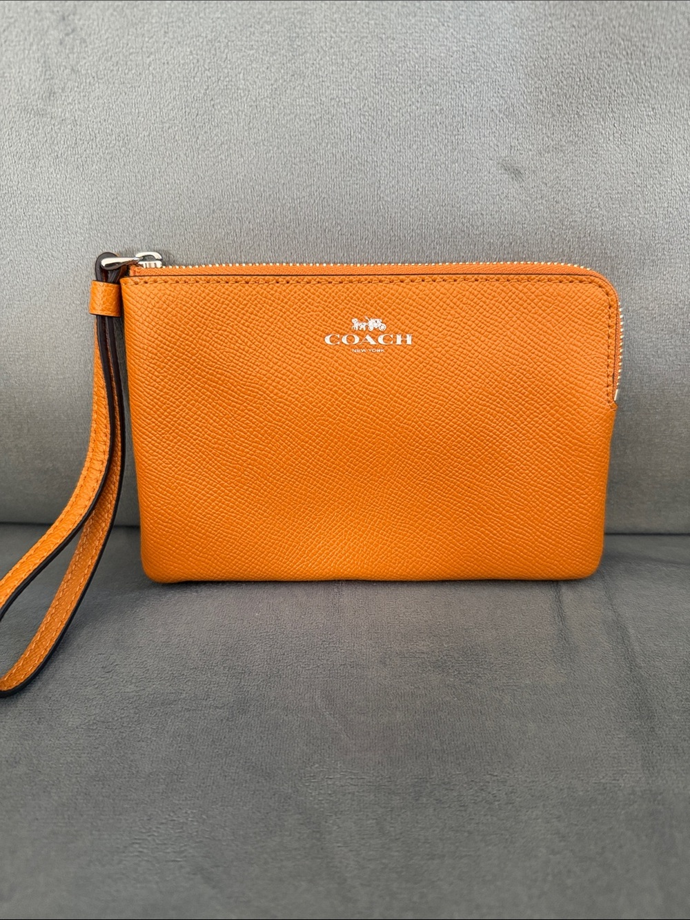 COACH Orange Leather Wristlet Clutch